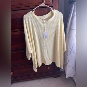 Pale yellow flowy top, bought from a local boutique but no longer need the top!